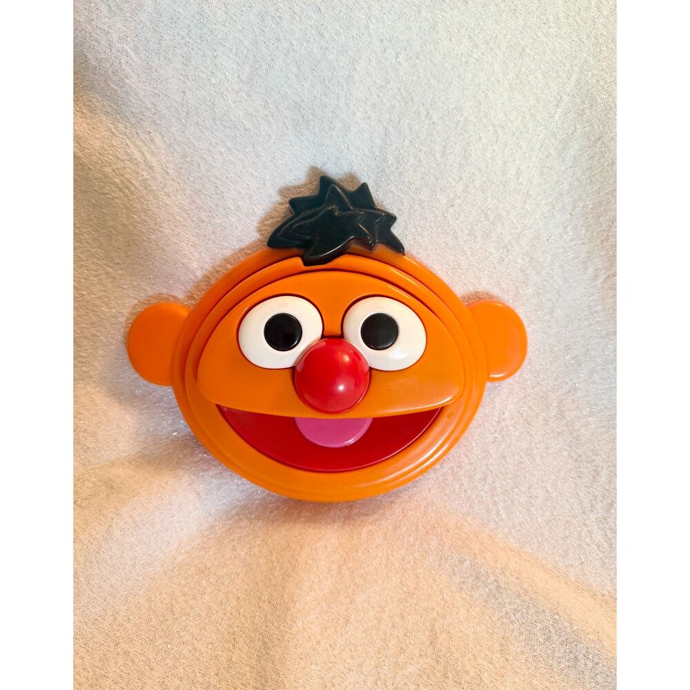Ernie face piece from a 1996 Tyco Preschool Sesame Street 3D Stacking Puzzle